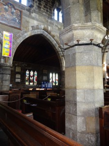 Candlestick holder attached to column