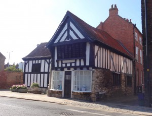 Building fairly close to the town side of the church gate