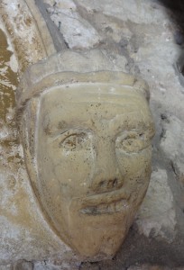Face on right hand side of the entrance door