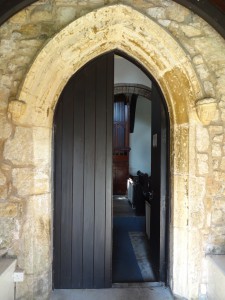 External doorway containing the two faces 