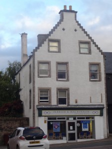 Old building on same side of street