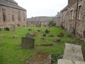 Street is behind and the back of the Tollbooth is on the right