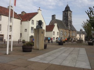 Culross - Town House, site of town official weighing beam, the tron, statue and information about another famous inhabitant and some quayside warehouses