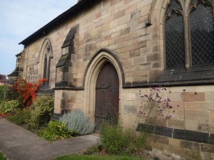 Side of church with plantings