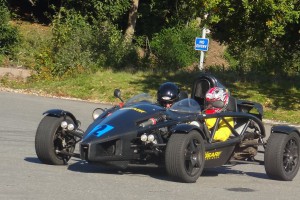 The chauffeured racing car 