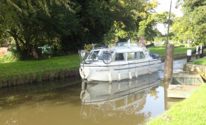 A previously moored boat on the move