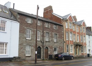 Streetscape showing what is likely to be a mounting block for horse riders