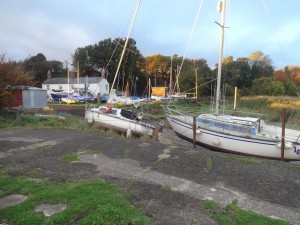 Some laid up boats near the clubhouse and the water