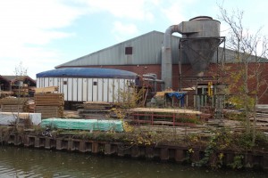 One of the many timber yards still beside the canal. The white and blue structure contains wood shavings from the timber business