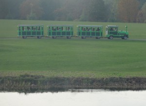 The little train ferrying visitors from the car park to the castle and seen from a castle window