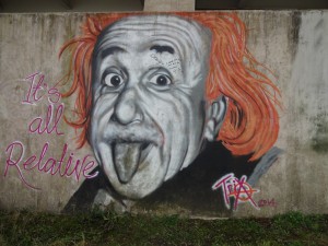 Einstein on a bridge underpass down beside the canal