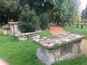 St John the Baptist churchyard looking back towards the entrance through the trees